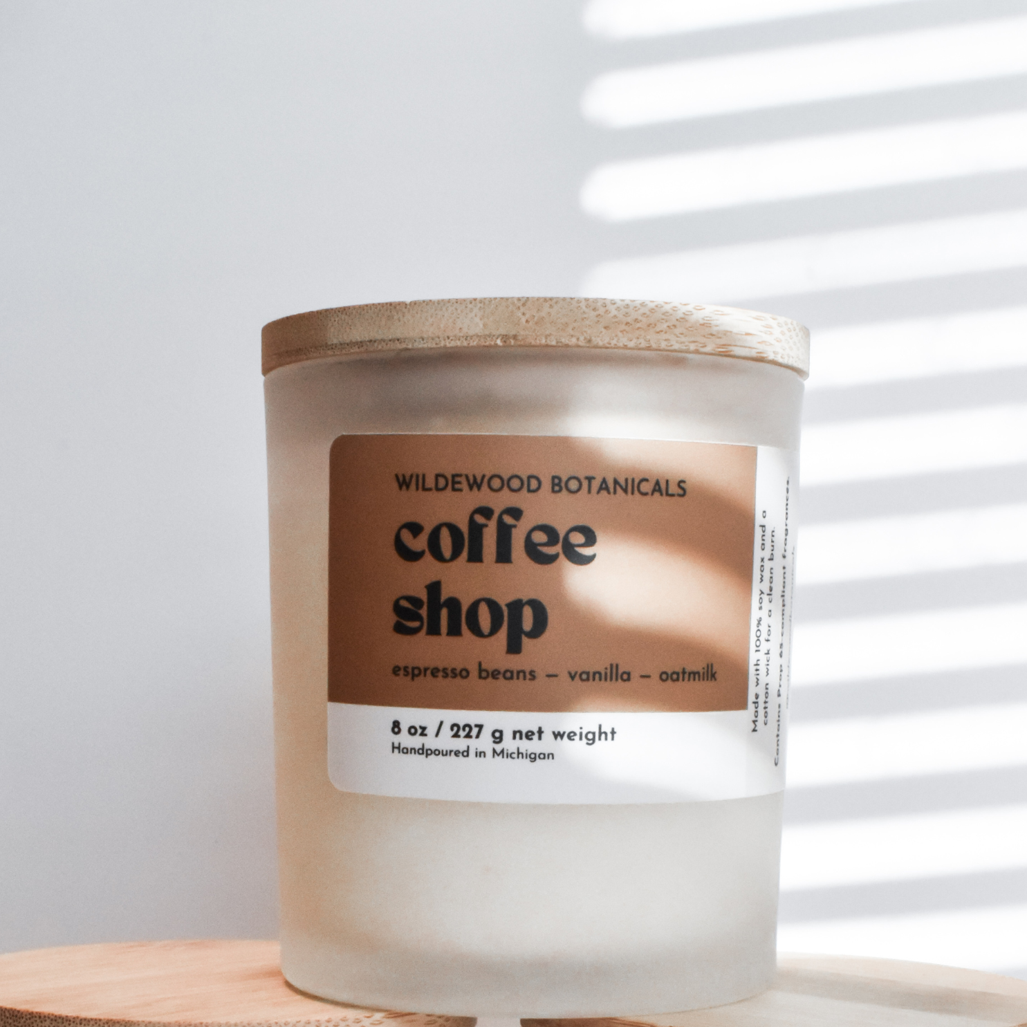 wildewood botanicals coffee shop candle in the regular size on a white background