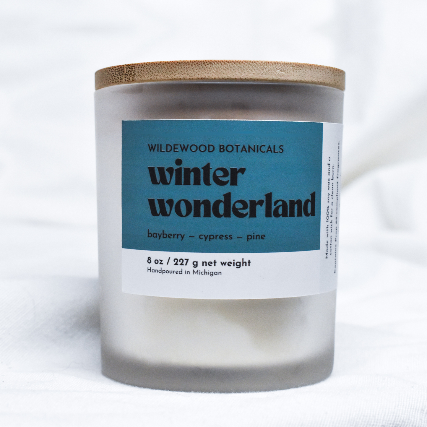 'Winter Wonderland soy candle by Wildewood Botanicals on a white background